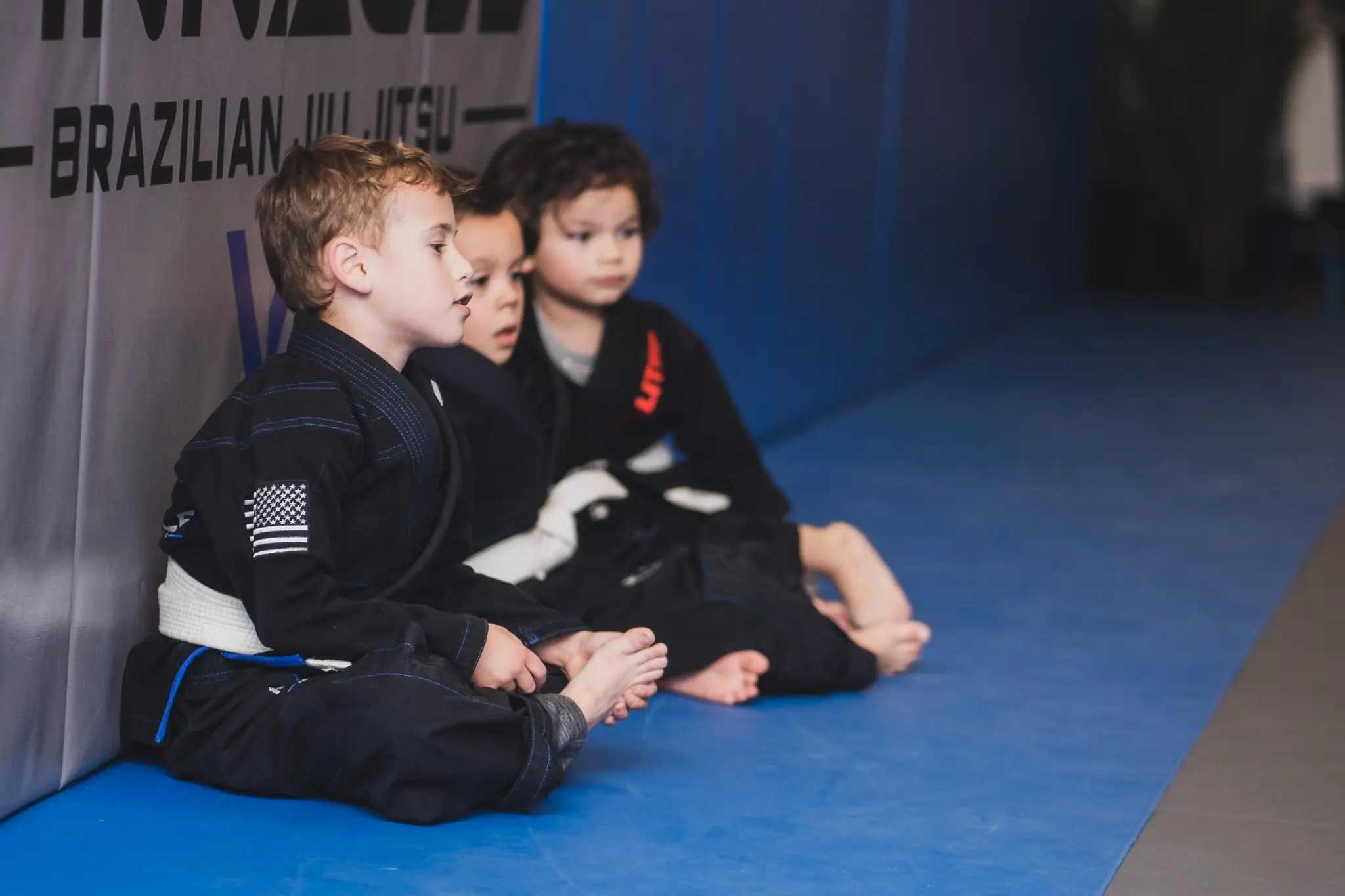 Kids on the mats during a youth Brazilian Jiu Jitsu class