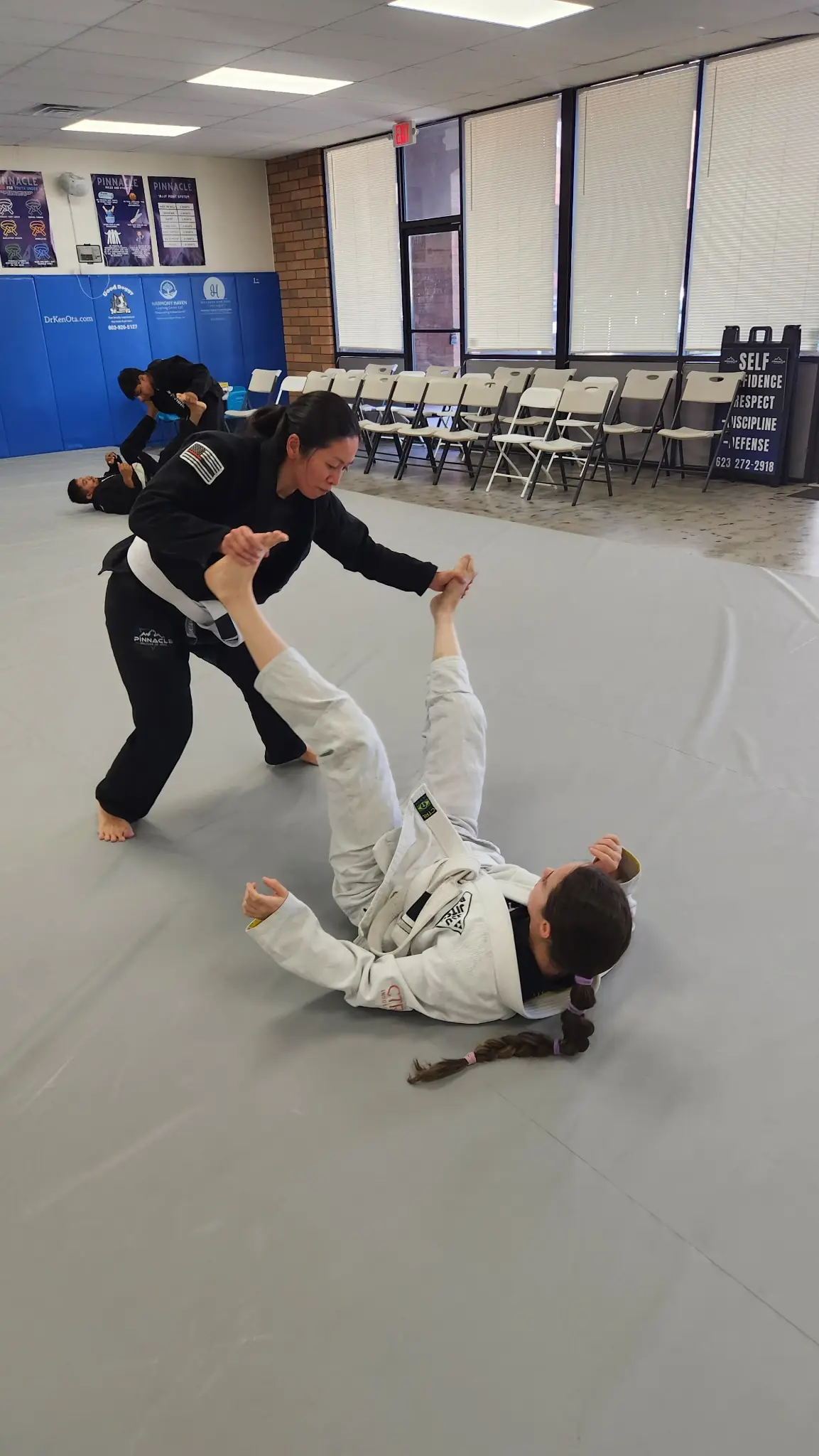 Women training together in the ladies self-defense BJJ class